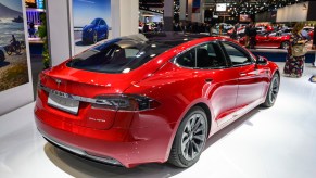 Tesla Model S in red at the auto show