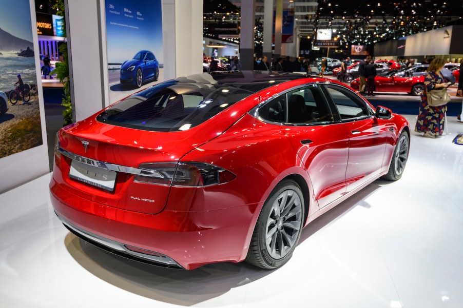 Tesla Model S in red at the auto show