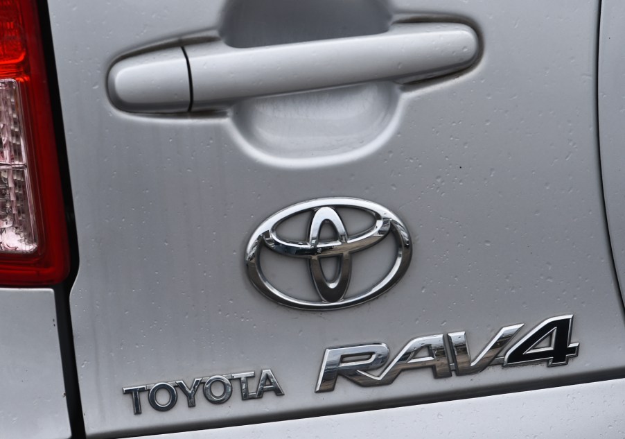 Zoomed-in picture of the Toyota logo on a used Toyota RAV4.