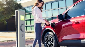 Ford Escape Plug-In Hybrid charging at a charge station