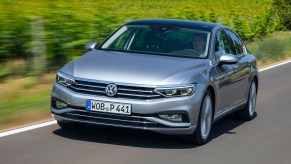 Volkswagen Passat driving through the countryside