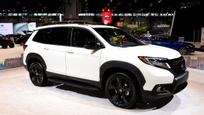 A 2019 Honda Passport on display at an auto show