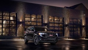 A 2020 GMC Terrain parked in front of several windows