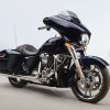 A dark-blue 2020 Harley-Davidson Street Glide parked on a beach