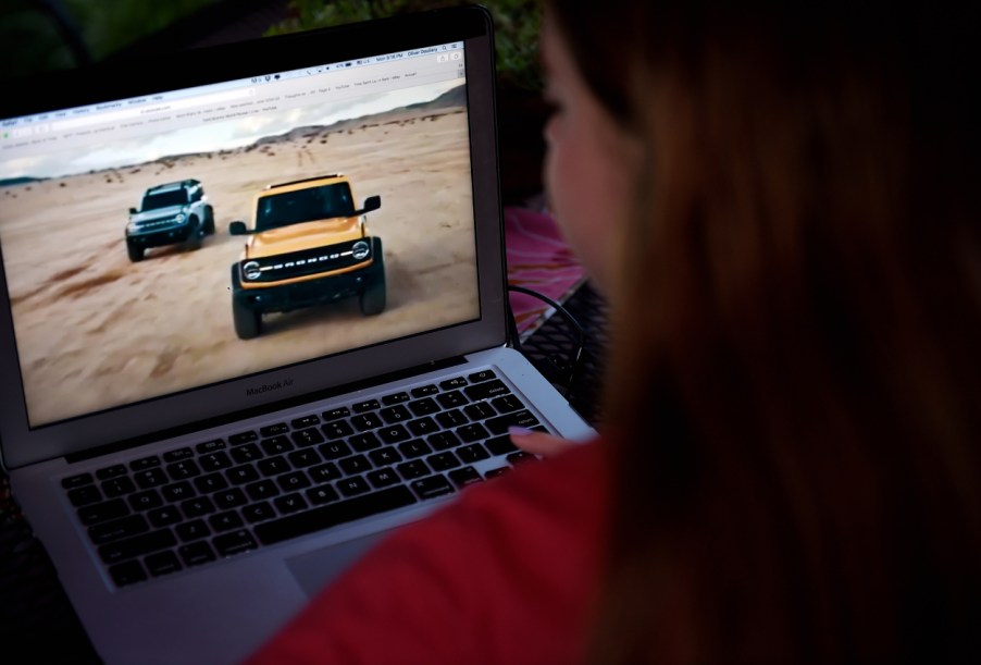 A person watching the premiere of the 2021 Ford Bronco