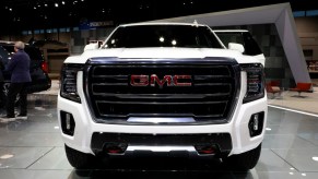 A 2021 GMC Yukon Denali on display at an auto show