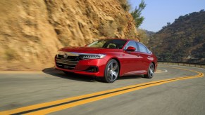 2021 Honda Accord Hybrid driving down a road