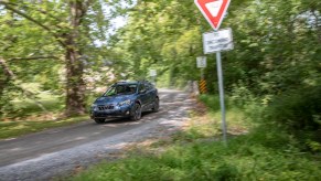 2021 Subaru Crosstrek driving down a street