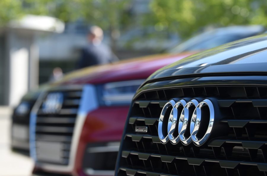 The Audi logo seen on the front grille of an SUV