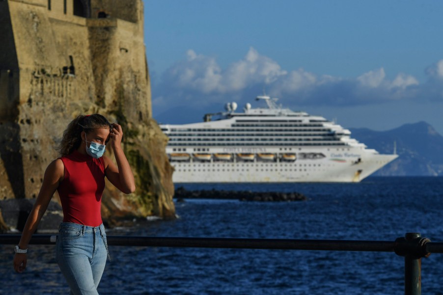 Woman wear face masks after the southern Italian region of Campania made it mandatory to wear protective face coverings outdoors 24 hours a day, to contain the coronavirus disease (COVID-19) outbreak.