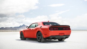 The 2020 Dodge Challenger SRT Super Stock facing away looking toward a cloudy, blue sky