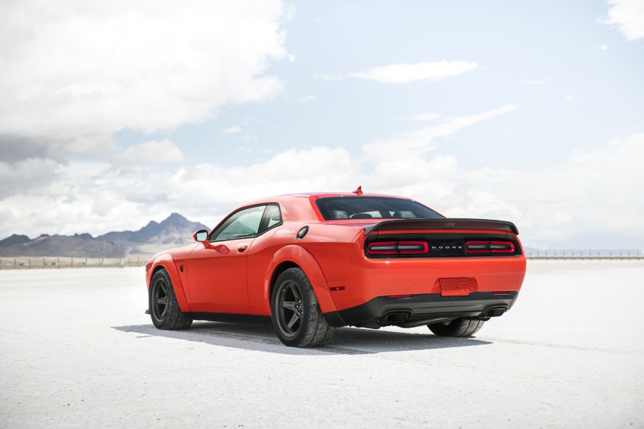 The 2020 Dodge Challenger SRT Super Stock facing away looking toward a cloudy, blue sky