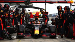 NUERBURG, GERMANY - OCTOBER 11: Max Verstappen of the Netherlands driving the (33) Aston Martin Red Bull Racing RB16 comes in for a tyre change during the F1 Eifel Grand Prix at Nuerburgring on October 11, 2020 in Nuerburg, Germany. (Photo by Mark Thompson/Getty Images)