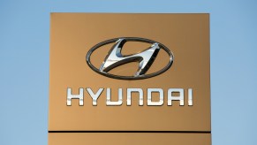 A close up image of the Hyundai logo.