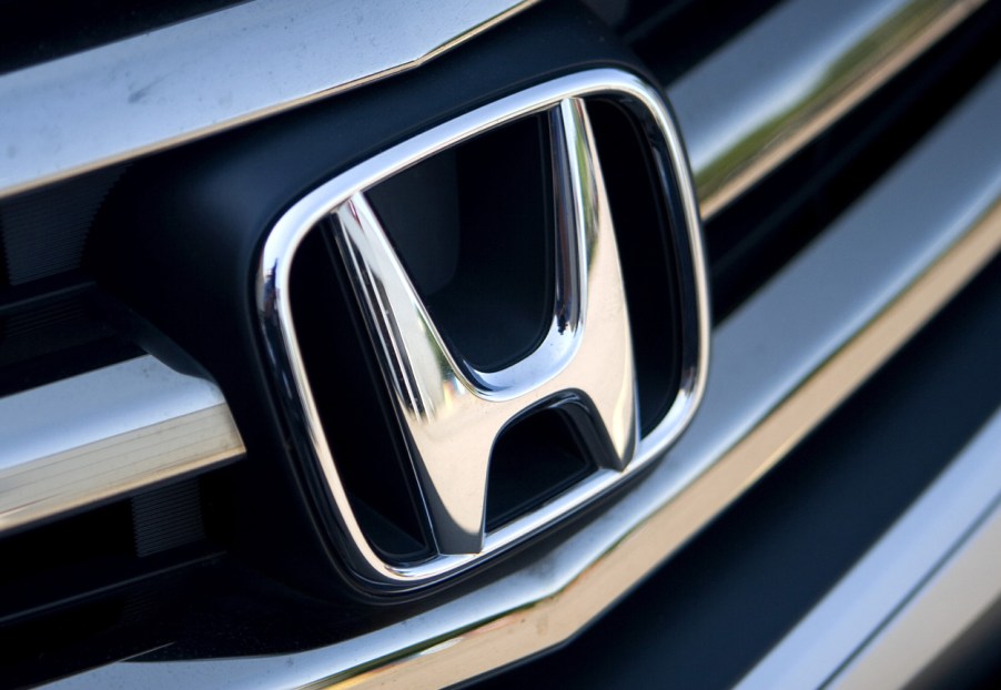 A Honda logo seen on the front of a car