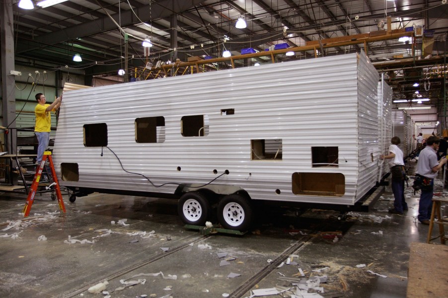 Workers at Jayco, Inc., the country's third largest maker of recreational vehicles, construct Jay Flight travel trailers