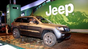 A Jeep Grand Cherokee on display at an auto show