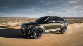 2020 Kia Telluride driving down a dirt road