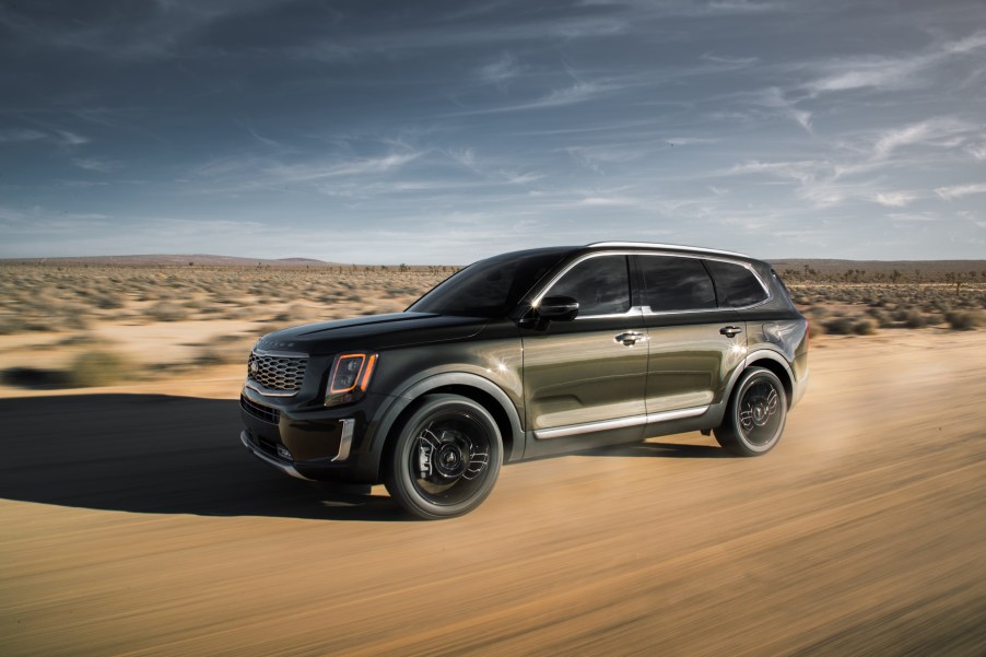 2020 Kia Telluride driving down a dirt road