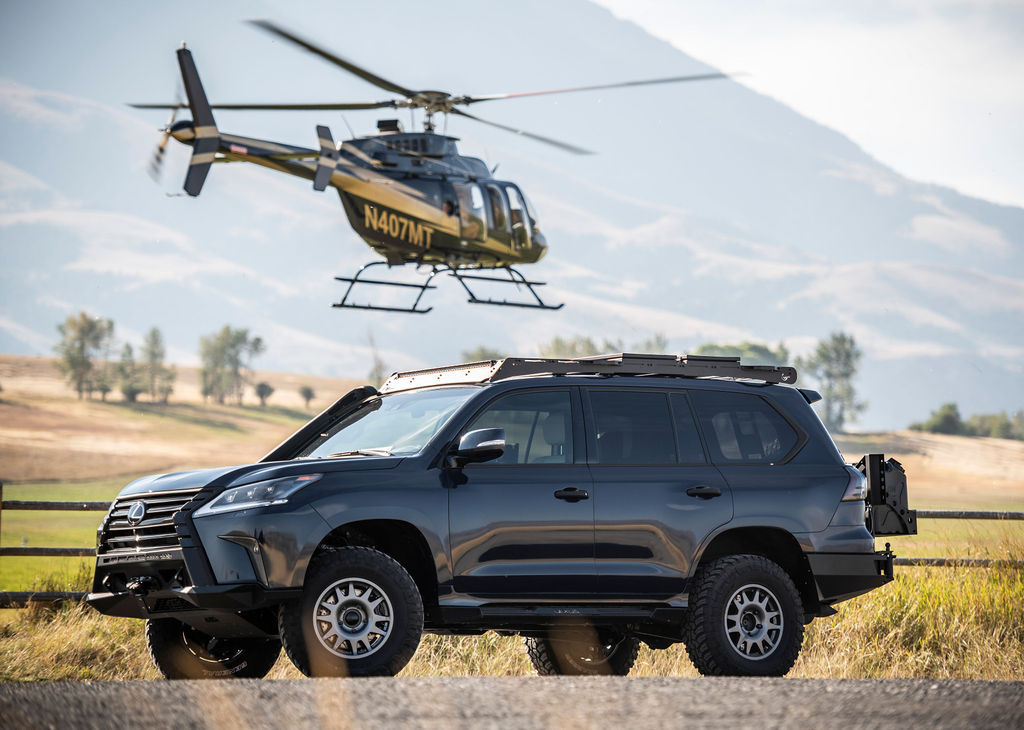 The J201 Concept in the foreground with a helicopter chase vehicle.