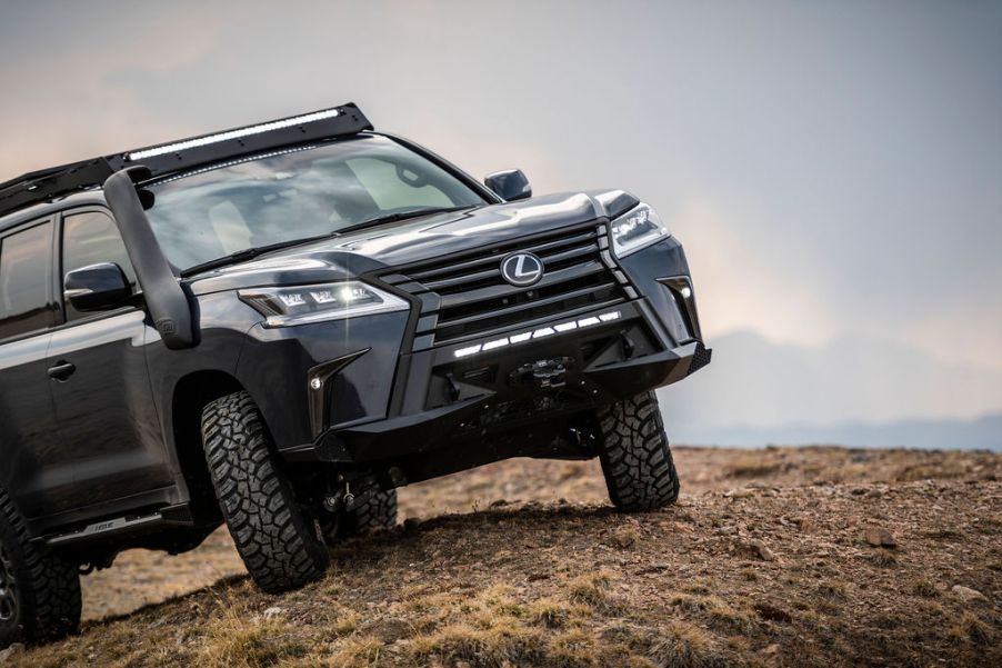 The front of the Lexus J201 Concept traversing dirt.