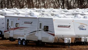 RVs sitting in the lot of a manufacturer