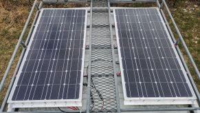 Solar panels mounted on the roof of a camper van