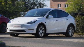 A picture taken on September 5, 2020 shows a "Tesla Model Y" car, an all-electric compact SUV by US electric car giant Tesla, during its presentation at the Automobile Club