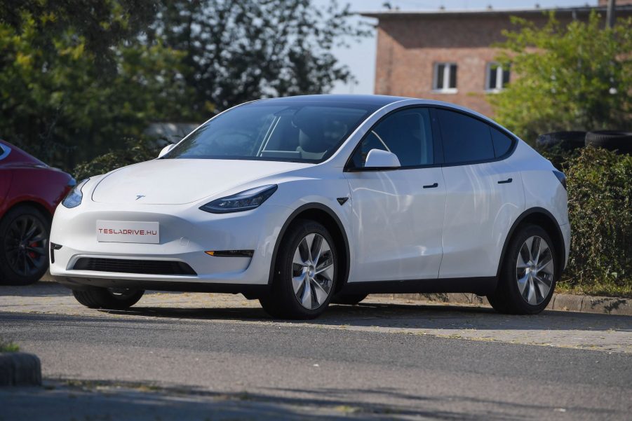 A picture taken on September 5, 2020 shows a "Tesla Model Y" car, an all-electric compact SUV by US electric car giant Tesla, during its presentation at the Automobile Club