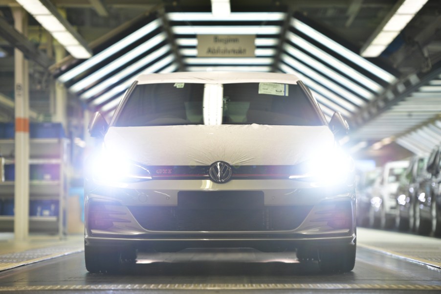 A Volkswagen Golf GTI rolls off the assembly line