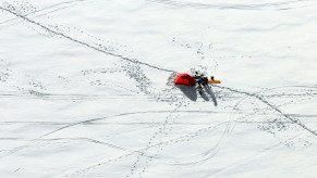 Tent on snowfield of mountaineers climbing the Mont Blanc in the French Alps, France