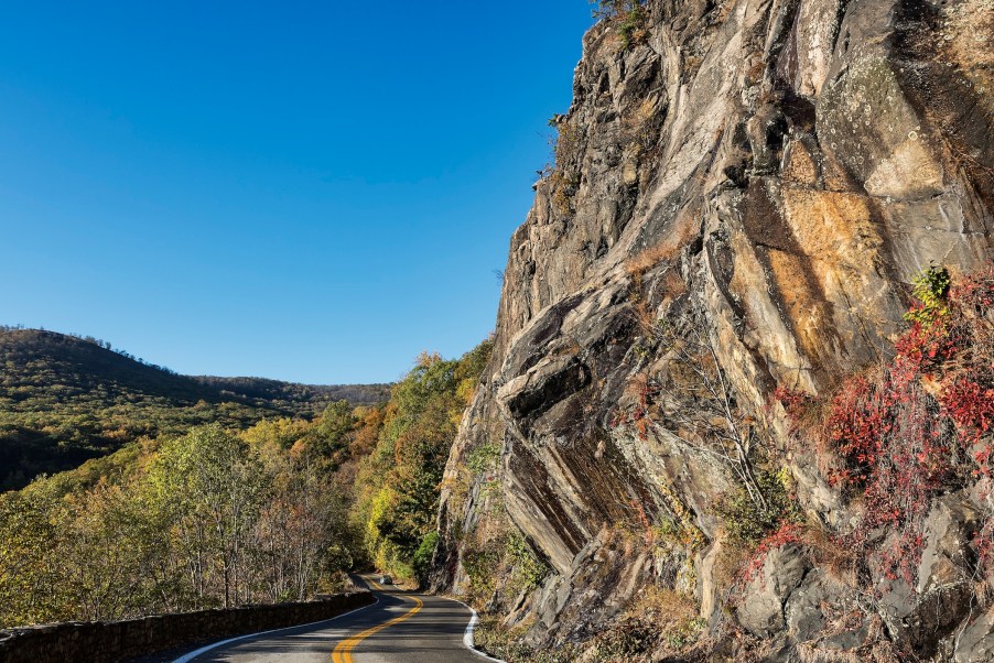 Perfect northeast road trip scene. Mountain road through Storm King State Park.