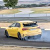 A photo of the Mercedes-AMG A 45 S utilizing its drift mode on track.