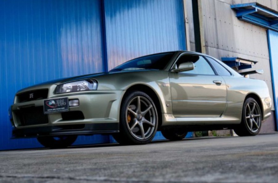 A light-green 2002 R34 Nissan Skyline GT-R V-Spec II Nur