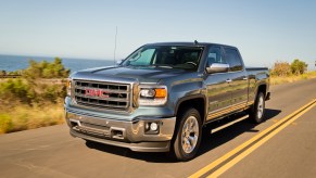 2014 GMC Sierra 1500 rolling down the road