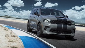 A gray-and-black 2021 Dodge Durango SRT Hellcat on a racetrack