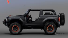 The side view of the black Ford Bronco Badlands Sasquatch 2-Door SEMA Concept