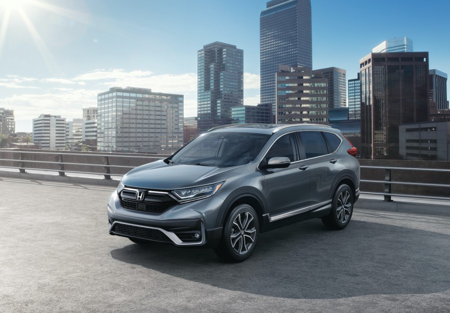 A gray 2021 Honda CR-V Touring in a city