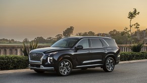 A black 2021 Hyundai Palisade parked on display