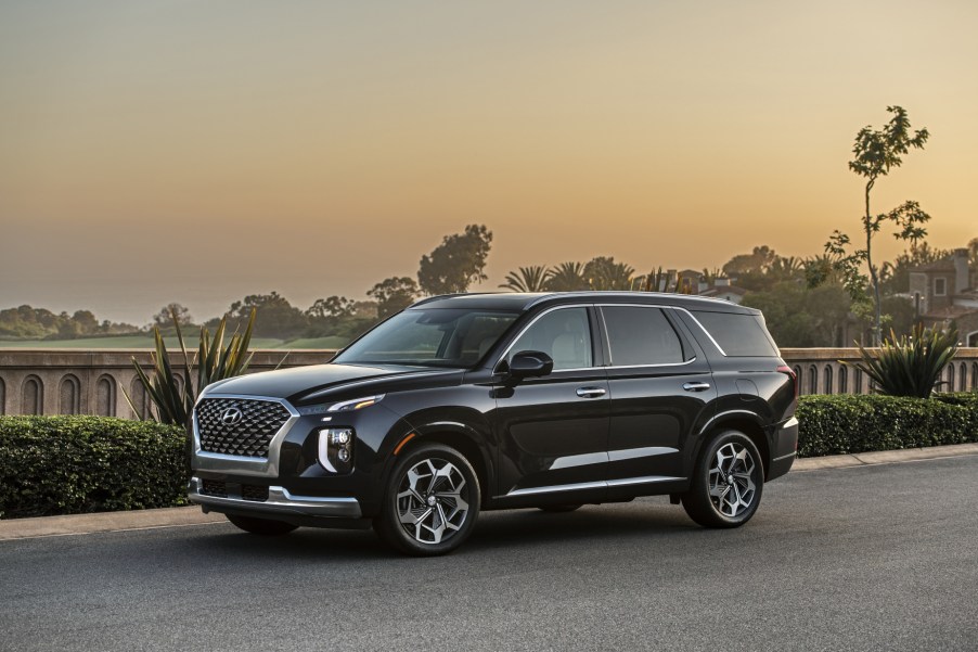 A black 2021 Hyundai Palisade parked on display