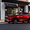 An image of a red Mazda CX-5 parked outside.