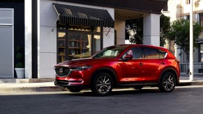 An image of a red Mazda CX-5 parked outside.