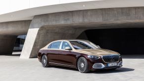 A gold-and-maroon 2021 Mercedes-Maybach S-Class