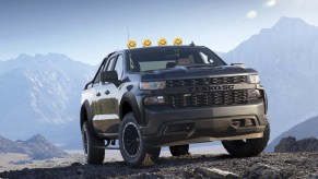 A black 2021 SVE Yenko Chevrolet Silverado Off-Road climbs a mountain