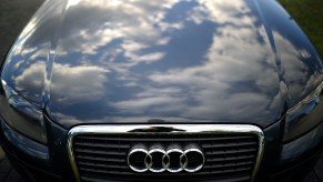 Clouds reflected on the hood of a parked Audi A3