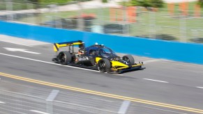 A photo of the Roborace DevBot at a race track.