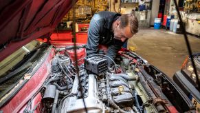 Car mechanic doing repair work