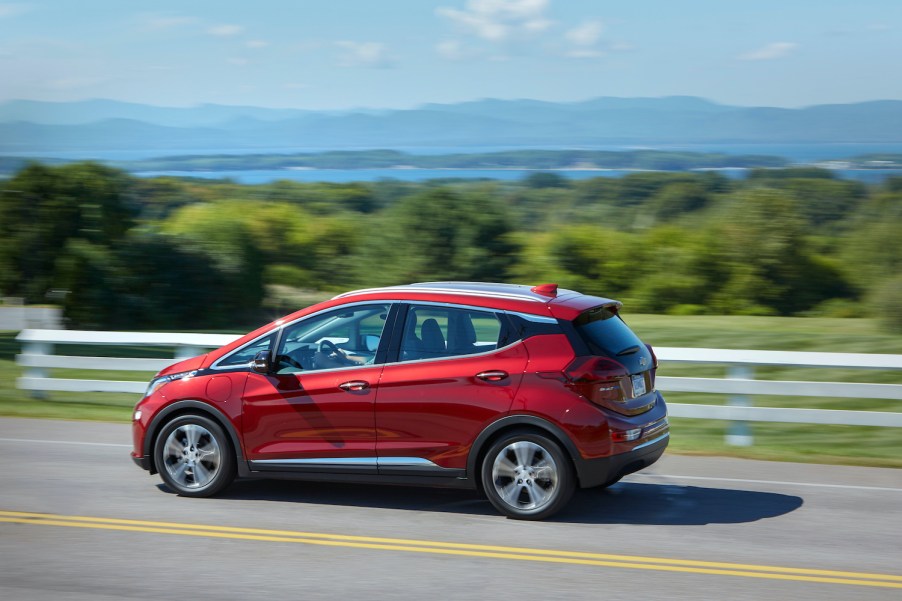 Chevrolet Bolt EV driving past the mountains