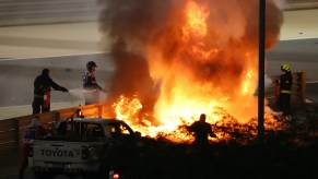 An image of a recent F1 crash in Bahrain involving HAAS driver Romaine Grosjean.