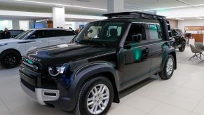 A Land Rover Defender is on display at the showroom opening of the "Land Rover and Jaguar" brands